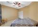 Cozy bedroom features carpet floors, ceiling fan, and natural light at 8324 W Charleston Blvd # 2053, Las Vegas, NV 89117