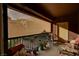 Cozy covered patio with outdoor seating and plants at 8324 W Charleston Blvd # 2053, Las Vegas, NV 89117