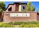 Community sign for Fulton Park, set amidst lush greenery and vibrant flowers at 8324 W Charleston Blvd # 2053, Las Vegas, NV 89117