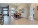 Sunlit dining area with high ceilings, tile floors, and easy access to the outdoor space at 8346 Christinas Cove Ave, Las Vegas, NV 89131