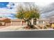 Charming single-story home featuring a well-manicured front yard and a three-car garage at 8346 Christinas Cove Ave, Las Vegas, NV 89131