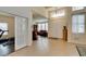 Inviting foyer with tile flooring and ample natural light, creating a warm and welcoming entrance to the home at 8346 Christinas Cove Ave, Las Vegas, NV 89131
