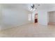 Large bedroom featuring tile floors, a ceiling fan, and ensuite bathroom at 8872 Perfect Diamond Ct, Las Vegas, NV 89129