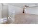 Spacious bonus room with carpet floors and view of ensuite bathroom at 8872 Perfect Diamond Ct, Las Vegas, NV 89129