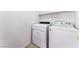 Functional laundry room featuring modern washer and dryer units for convenient laundry care at 8872 Perfect Diamond Ct, Las Vegas, NV 89129