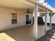 Covered patio with ceiling fan, overlooking a rock garden with decorative stone accents at 8872 Perfect Diamond Ct, Las Vegas, NV 89129