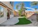 The backyard features desert landscaping, a patio, and a basketball court at 9416 Highview Rock Ct, Las Vegas, NV 89149