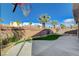 This backyard features desert landscaping, a basketball court, and a patio at 9416 Highview Rock Ct, Las Vegas, NV 89149