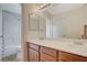 Bathroom featuring double sinks, white countertops, and a shower-tub combo at 9416 Highview Rock Ct, Las Vegas, NV 89149