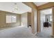 Spacious bonus room with good lighting and a doorway to another room at 9416 Highview Rock Ct, Las Vegas, NV 89149