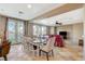 Open concept kitchen features tile flooring and is conveniently connected to the living room and outdoor dining area at 9416 Highview Rock Ct, Las Vegas, NV 89149