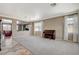 Spacious living room with neutral walls and tile flooring detail at 9416 Highview Rock Ct, Las Vegas, NV 89149