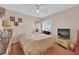 Bedroom featuring a ceiling fan and a window with blinds and a cozy bed at 943 Sedona Rd, Henderson, NV 89014