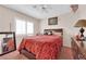 Bedroom featuring a comfortable bed and a window with blinds and a comfortable bed at 943 Sedona Rd, Henderson, NV 89014