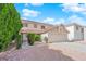 Charming home with a two-car garage, neutral paint, and well-manicured shrubs at 943 Sedona Rd, Henderson, NV 89014