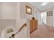 Hallway upstairs featuring wooden trim and access to the bathroom and bedrooms upstairs at 943 Sedona Rd, Henderson, NV 89014