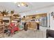 View of the kitchen with tile flooring, wood cabinets, and stainless steel appliances at 943 Sedona Rd, Henderson, NV 89014