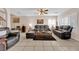 Spacious living room featuring tile floors, plentiful windows, and neutral paint at 943 Sedona Rd, Henderson, NV 89014