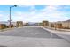 Stone pillars mark the entrance to this Primary planned community set against a mountain backdrop at 964 Norwood Heights Ln, Las Vegas, NV 89138