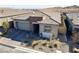Single-story home boasts tasteful stone accents and a well-maintained, paver driveway at 964 Norwood Heights Ln, Las Vegas, NV 89138