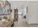 Bright hallway featuring wood-look tile floors and stylish decor at 964 Norwood Heights Ln, Las Vegas, NV 89138