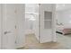 Hallway showcasing access to a bathroom and bedroom, perfect for Gathering or guests at 964 Norwood Heights Ln, Las Vegas, NV 89138