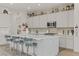 Bright kitchen featuring a large island, stainless steel appliances, and stylish decor at 964 Norwood Heights Ln, Las Vegas, NV 89138