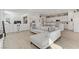 Open floor plan with modern sofa, kitchen, and decorative shelving at 964 Norwood Heights Ln, Las Vegas, NV 89138