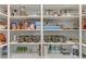 Well-organized pantry with stocked shelves, providing ample storage space at 964 Norwood Heights Ln, Las Vegas, NV 89138