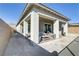 Inviting covered patio with stylish furniture offers a relaxing outdoor living space at 964 Norwood Heights Ln, Las Vegas, NV 89138