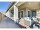Spacious covered patio with ample seating, perfect for outdoor entertaining at 964 Norwood Heights Ln, Las Vegas, NV 89138
