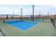 Outdoor pickleball courts provide recreational opportunities and stunning mountain views for the community at 964 Norwood Heights Ln, Las Vegas, NV 89138