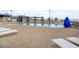 Community pool with lounge chairs and shade structures for relaxation at 964 Norwood Heights Ln, Las Vegas, NV 89138