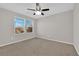 Bedroom features a ceiling fan and a bright window at 10223 Aragon Crown Rd, Las Vegas, NV 89135