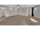 Spacious bonus room with a ceiling fan, neutral paint, and plush carpeting at 10223 Aragon Crown Rd, Las Vegas, NV 89135