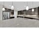 Modern kitchen featuring stainless steel appliances and granite countertops at 10223 Aragon Crown Rd, Las Vegas, NV 89135