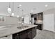 Spacious kitchen with large island, stainless steel appliances, and open layout at 10223 Aragon Crown Rd, Las Vegas, NV 89135