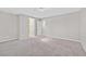 Spacious bedroom with neutral carpeting and ensuite bath at 10574 Siesta Key St, Las Vegas, NV 89141