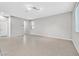 Bright living room featuring neutral walls, tiled floors, and natural light at 10574 Siesta Key St, Las Vegas, NV 89141