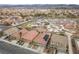 Overhead view of a Gathering-friendly neighborhood near a park, showcasing lovely homes and desert landscaping at 1140 Highbury Grove St, Henderson, NV 89002