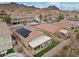 Overhead view of a home with a patio, desert landscaping and mountain views at 1140 Highbury Grove St, Henderson, NV 89002