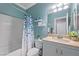 Bright bathroom featuring a shower-tub combination and updated vanity at 1140 Highbury Grove St, Henderson, NV 89002