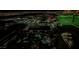 Night aerial view of property featuring pools, buildings and nearby city lights at 125 E Harmon Ave # 3406 & 3408, Las Vegas, NV 89109