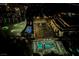 Night aerial view features golf, pool, and parking at the resort at 125 E Harmon Ave # 3406 & 3408, Las Vegas, NV 89109