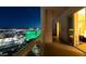 Enjoy this condo balcony view with the city skyline and the lights and view from the bedroom at 125 E Harmon Ave # 3406 & 3408, Las Vegas, NV 89109