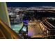 Stunning balcony view featuring city lights and Topgolf at night at 125 E Harmon Ave # 3406 & 3408, Las Vegas, NV 89109