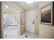 Entrance to hotel suite with tile floors and bathroom access at 125 E Harmon Ave # 3406 & 3408, Las Vegas, NV 89109