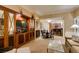 Open-concept living area combining a cozy living room with a dining space and kitchen view at 125 E Harmon Ave # 3406 & 3408, Las Vegas, NV 89109