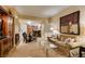 Inviting living room with a dining area and partial view of the kitchen at 125 E Harmon Ave # 3406 & 3408, Las Vegas, NV 89109