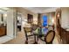 Elegant living room features a dining table, comfortable seating, and stunning city views at 125 E Harmon Ave # 3406 & 3408, Las Vegas, NV 89109